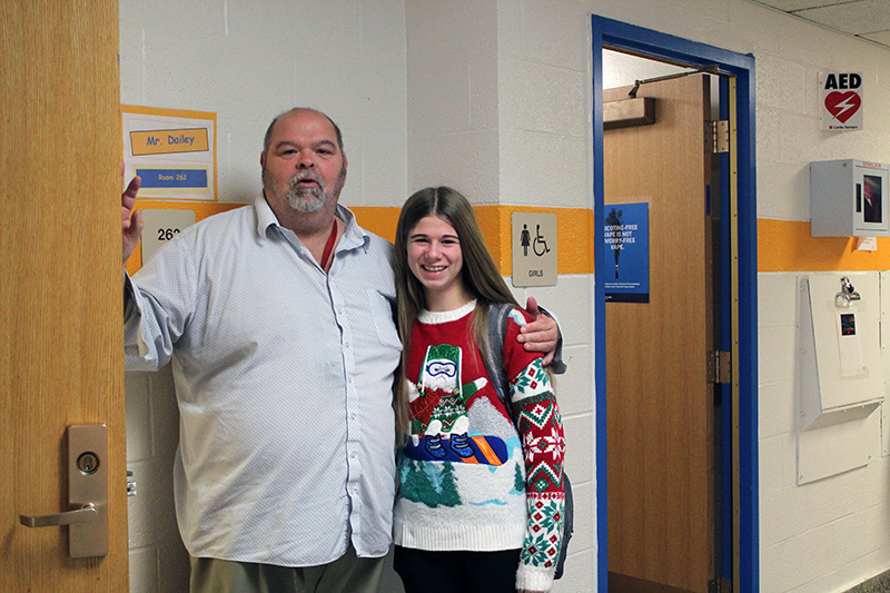 hs faculty member with a student during holiday spirit week