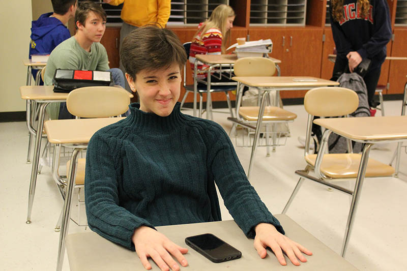 student sitting in study hall